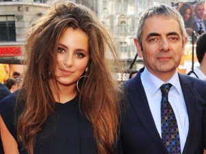 English actor, comedian, and screenwriter Rowan Atkinson, who is famous for his role as Mr. Bean in the television series, with his daughter, Lily.