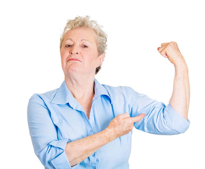 Strong woman. Senior elderly lady showing her strength